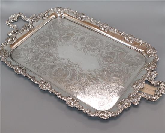 A silver plated two handled tray overall length 65cm